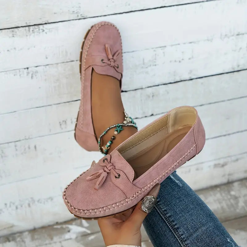Casual chic women's tassel loafers. Comfortable closed-toe slip-on flats for ladies everyday fashion.