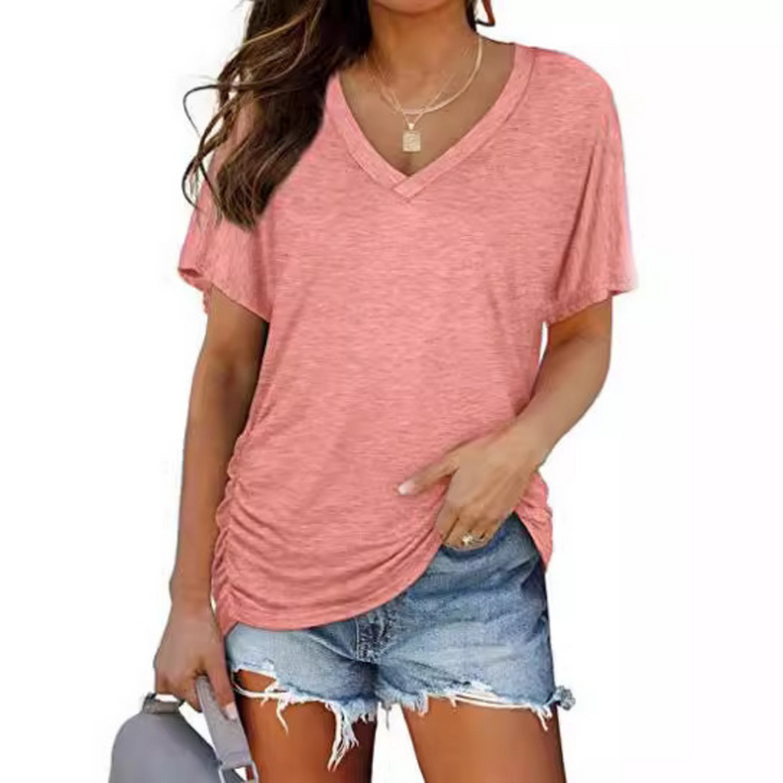 Loose fit women's V-neck shirt, classic long sleeve design for effortless style and comfort.