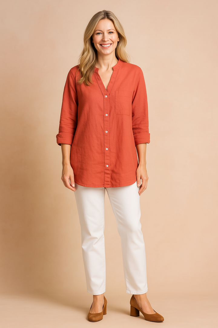 Women's classic white blouse with stand-up collar and chest pocket.