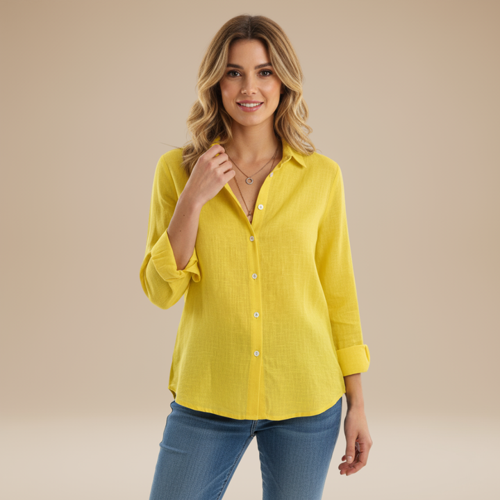 Model demonstrating the versatile style of a women's button-up shirt