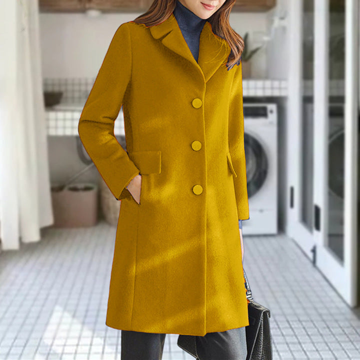 Model wearing a women's elegant wool blend coat, fashionable outerwear