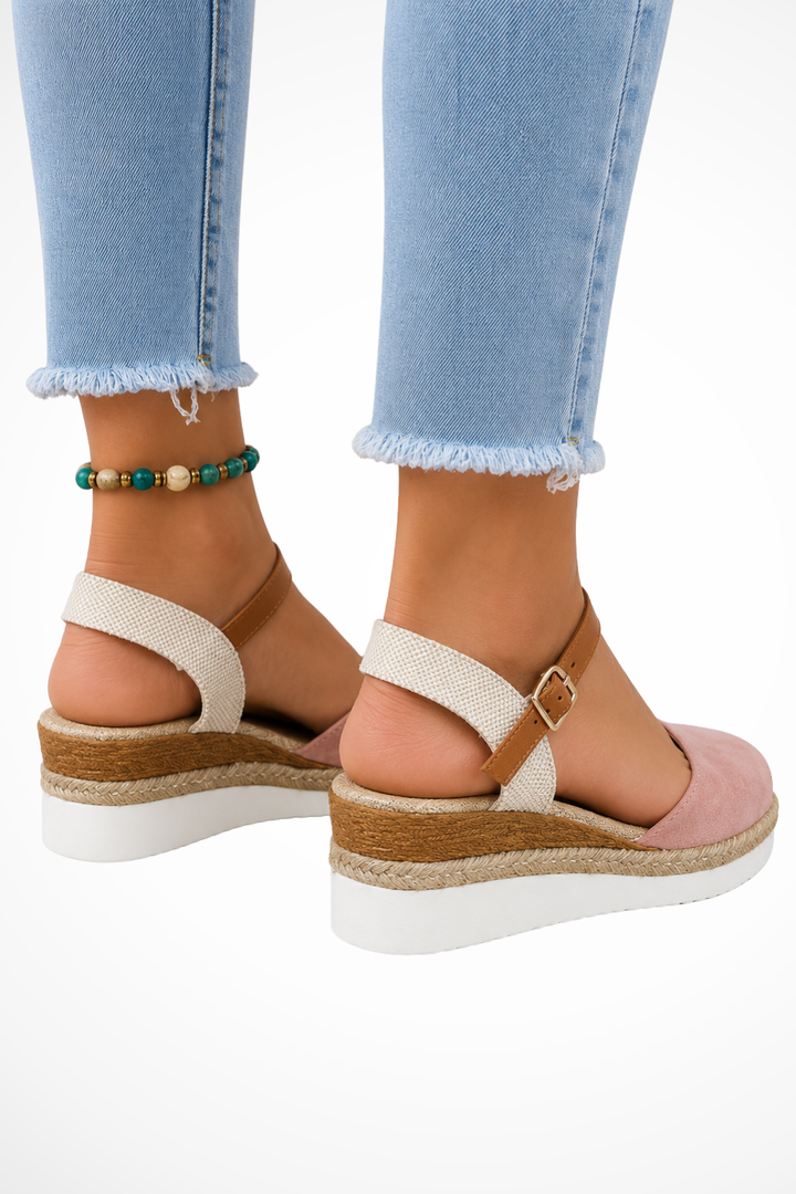 Elegant women's closed toe espadrille wedges, comfortable with an ankle strap, versatile for summer fashion footwear.