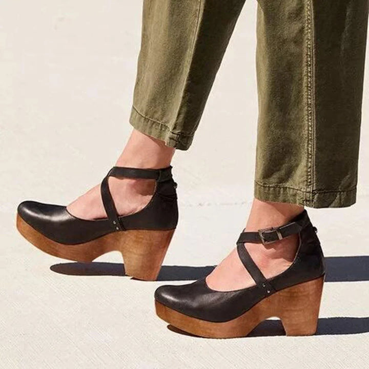Women's closed-toe Mary Jane platform wedge heels with secure ankle strap. Elegant and comfortable dress shoes.