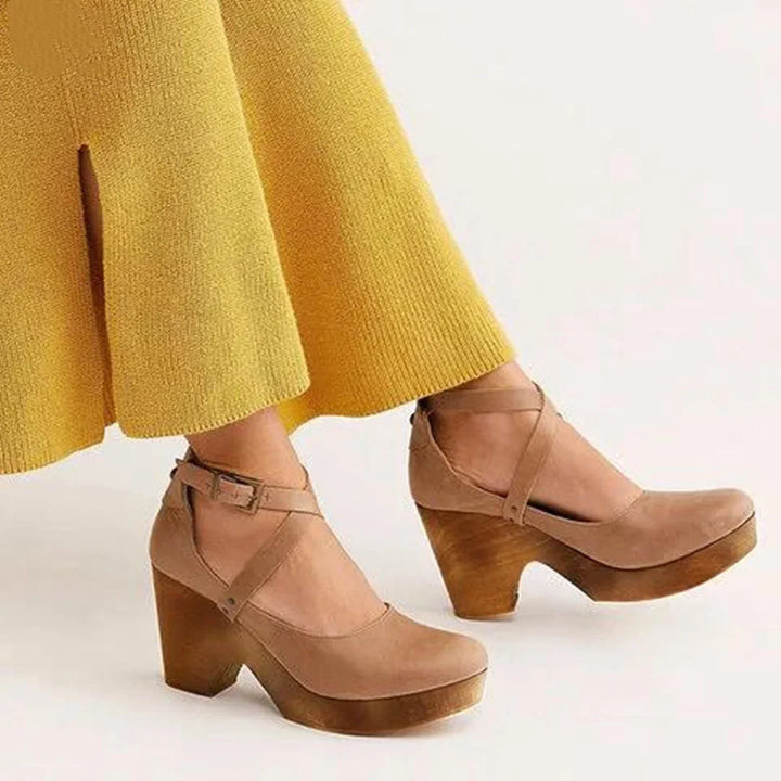 Dressy closed-toe Mary Jane platform wedge heels with ankle strap for women. Stylish and comfortable office wear.