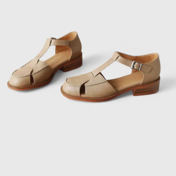 Elegant & secure women's closed-toe T-strap sandals, perfect for stylish summer everyday wear.