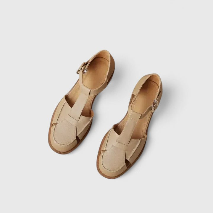 Stylish women's closed-toe T-strap sandals with block heel, perfect for casual summer everyday wear.