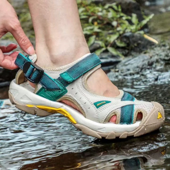Durable women's closed-toe outdoor sandals, water-friendly for hiking, travel, and adventure gear.