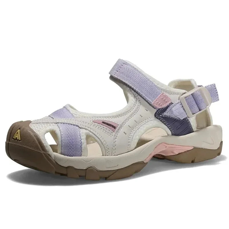 Protective women's closed-toe water sandals, ideal for outdoor adventures and wet conditions.