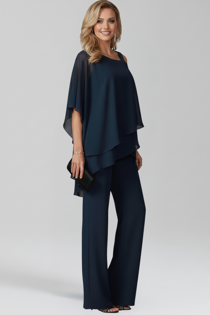 Comfortable flowing wide-leg jumpsuit for women, featuring a stylish cold-shoulder design. Versatile fashion.