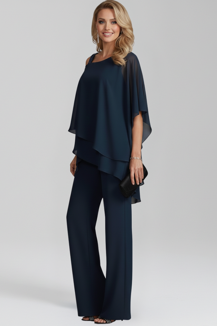 Modern women's wide-leg jumpsuit with graceful cold-shoulder cut. Flowing, breathable summer apparel.
