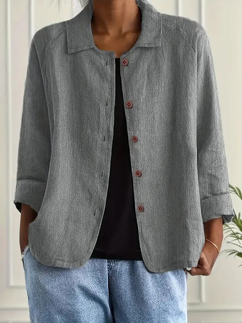 Smart casual women's collared button down blouse. Three-quarter sleeves provide a polished and comfortable look.