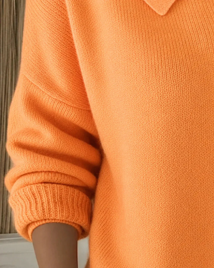 Collared button-front long-sleeve women's cardigan sweater. Offers cozy comfort and elegant style for any outfit.