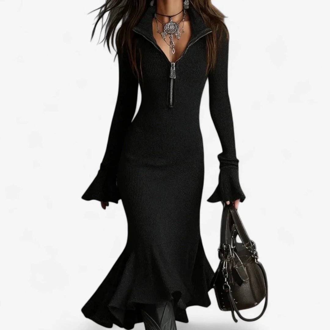 Elegant women's fashion midi dress with a collared neckline, half-zip, and distinctive flared cuffs & ruffle hem.