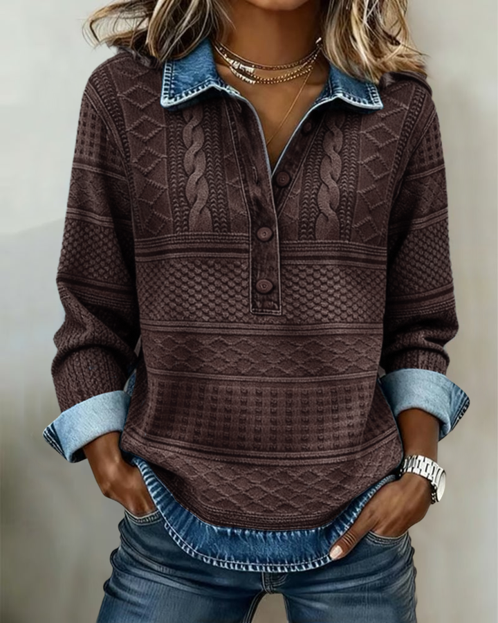 Soft women's textured sweatshirt featuring a half-zip collar & button placket. Relaxed fit, long sleeves comfort.
