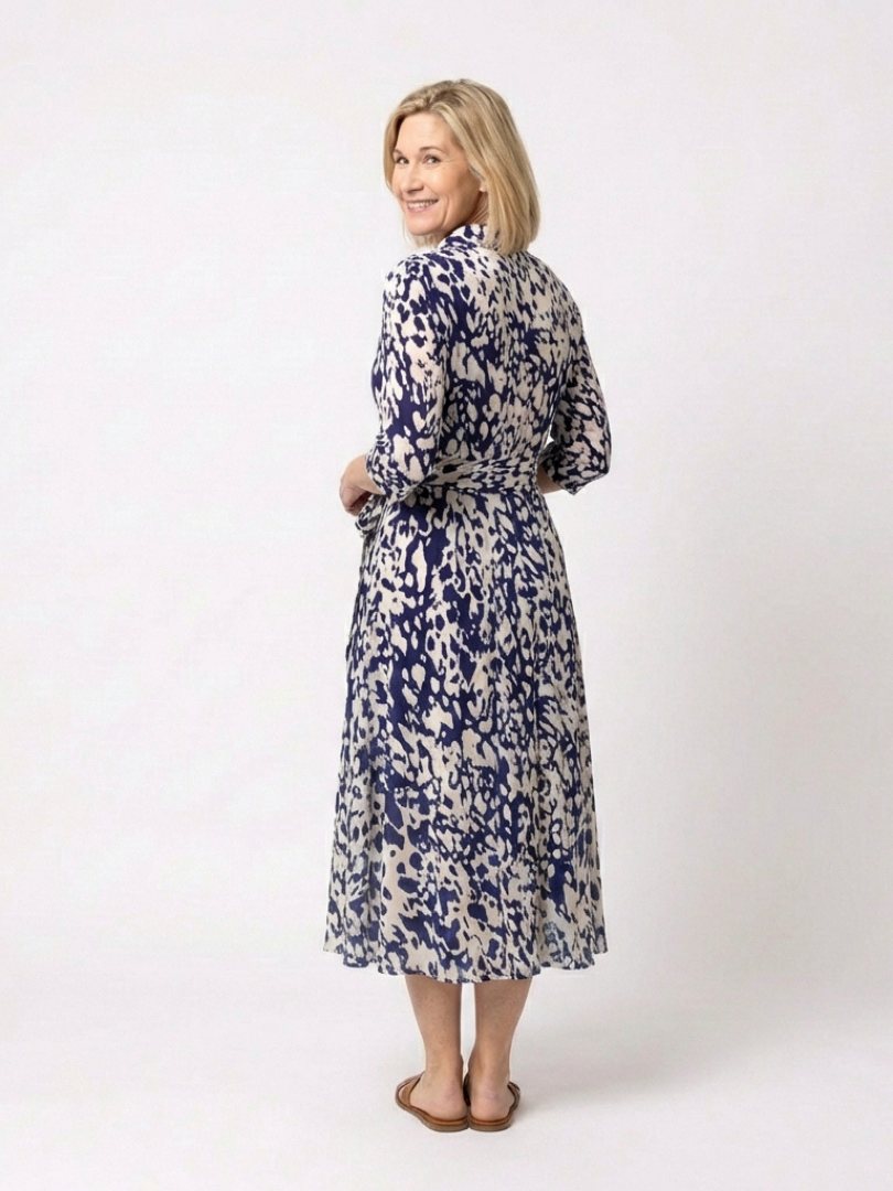 Versatile women's long sleeve collared midi dress with a stylish waist tie. Perfect for spring & autumn.