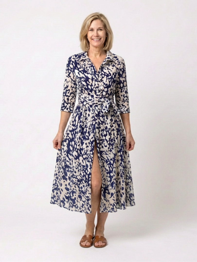 Elegant women's midi dress. Features a collared neckline, long sleeves & waist tie for comfortable casual wear.