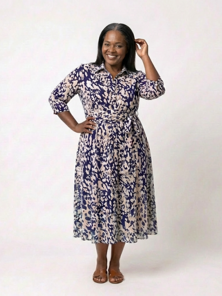 Stylish collared long sleeve midi dress for women, featuring a flattering waist tie. Ideal for spring/autumn.