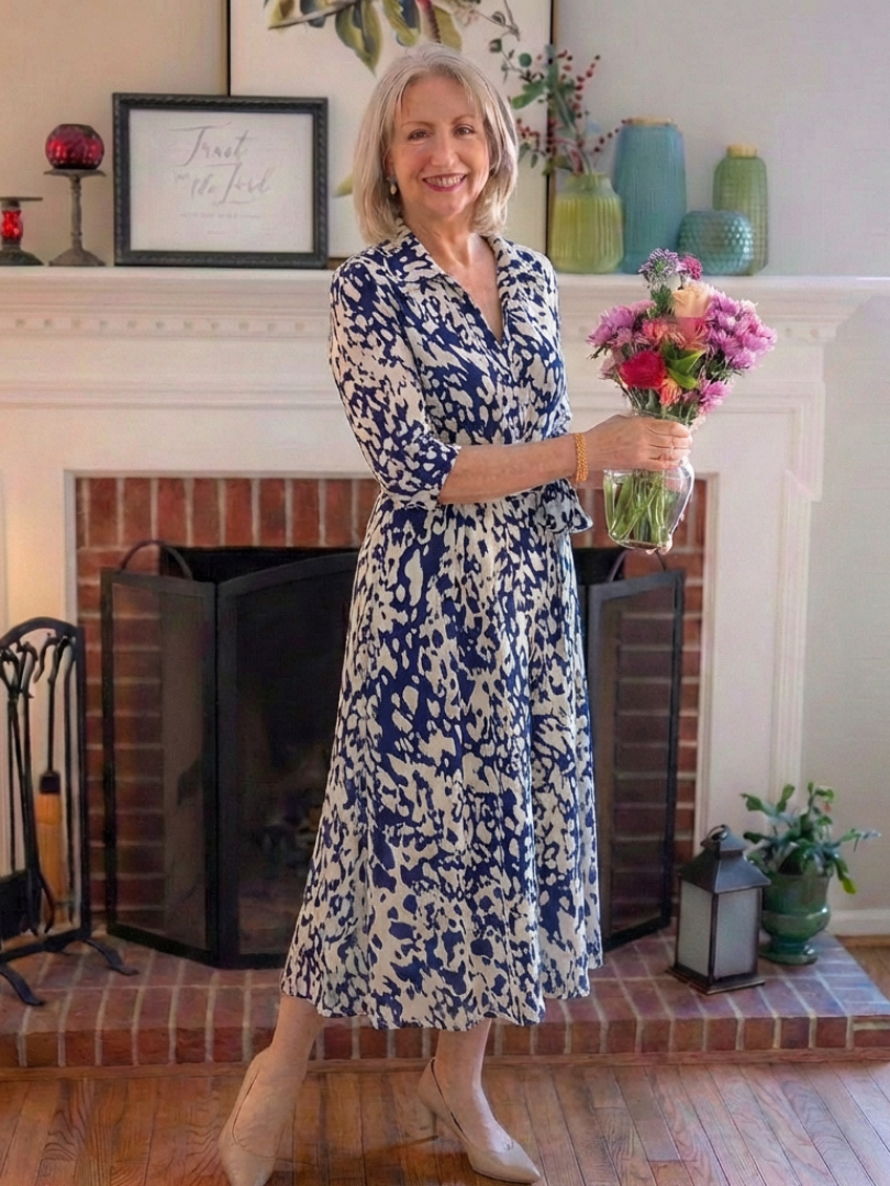 Casual yet elegant women's long sleeve midi dress with a collar and waist tie. Great for everyday comfort.