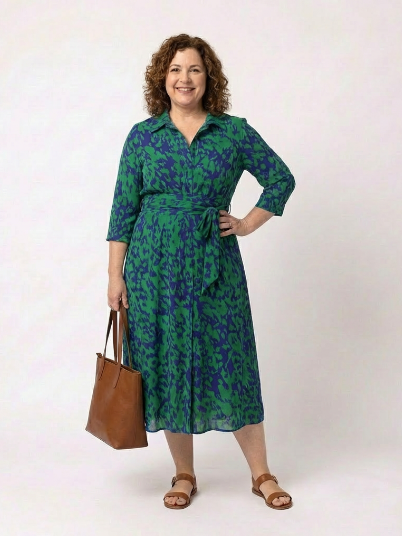 Comfortable women's long sleeve collared midi dress with a waist tie. Versatile for casual or elegant looks.