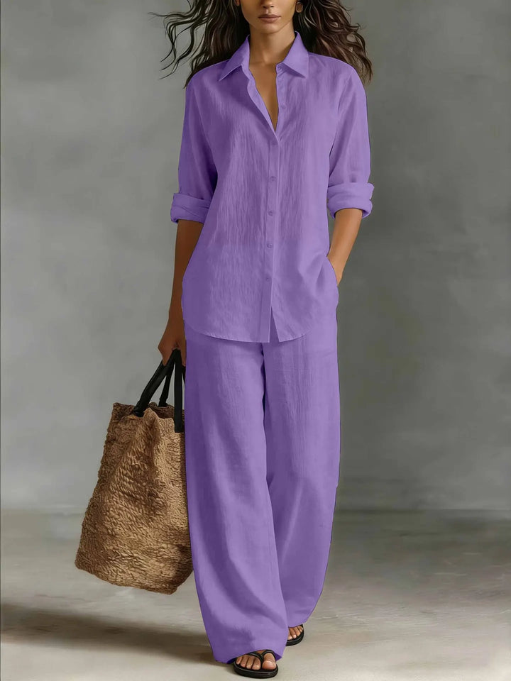 Women's collared long sleeve shirt from a two-piece set, paired with wide leg pants for a chic spring outfit.