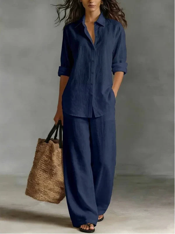 Casual women's long sleeve collared top & wide leg pants set, a comfortable spring/summer travel outfit.
