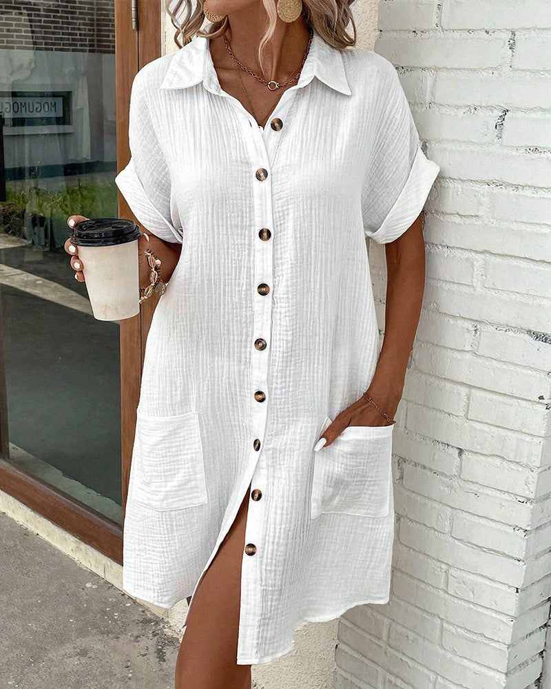 Everyday women's summer mini dress featuring a button front & short sleeves.
