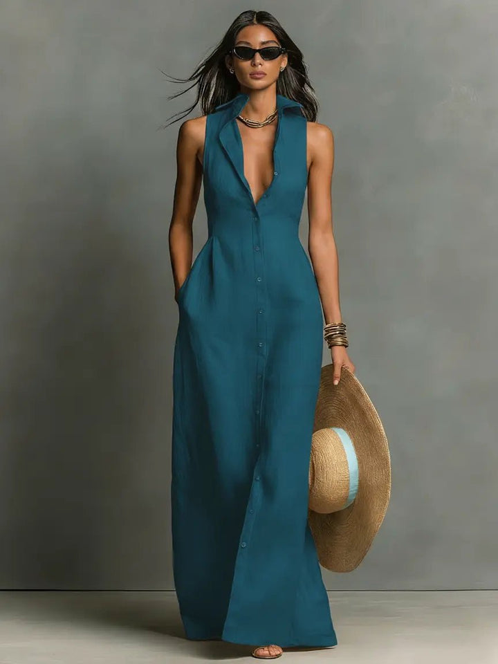 Versatile women's button-front collared maxi dress. Sleeveless, long. Great for casual or office summer wear.