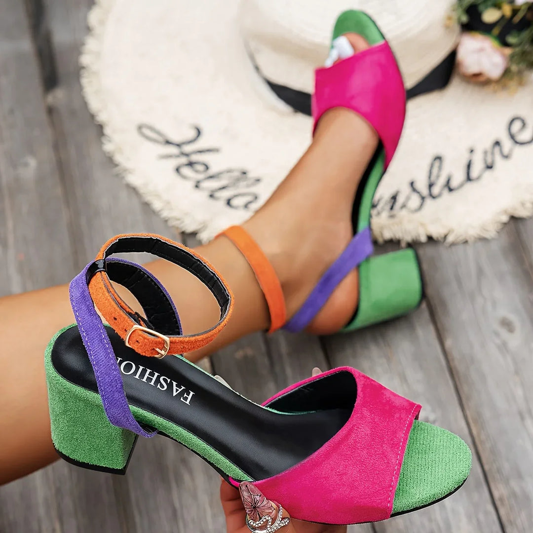 Front view of women's open-toe slingback sandals, showcasing the vibrant color-block design and block heel.