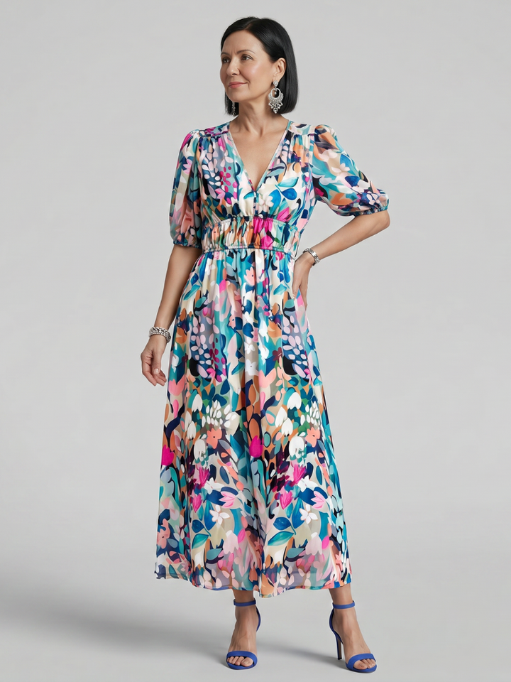 Colorful women's abstract print midi dress, featuring stylish puff sleeves and a flattering V-neck.