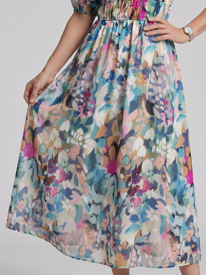 Versatile women's abstract print V-neck midi dress with puff sleeves, suitable for casual or elegant wear.