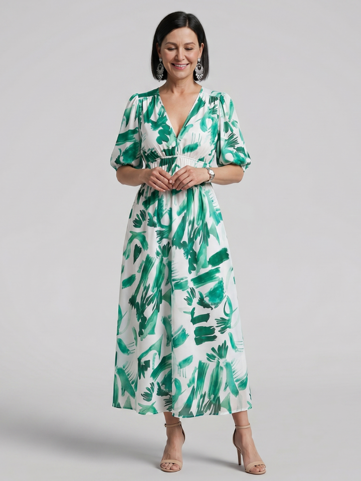 Eye-catching abstract print midi dress for women, featuring puff sleeves and a flattering V-neck.
