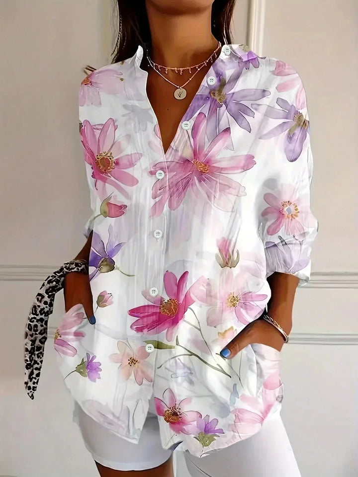 Versatile women's floral long sleeve blouse, ideal for casual outfits or everyday wear. Features a button-front.