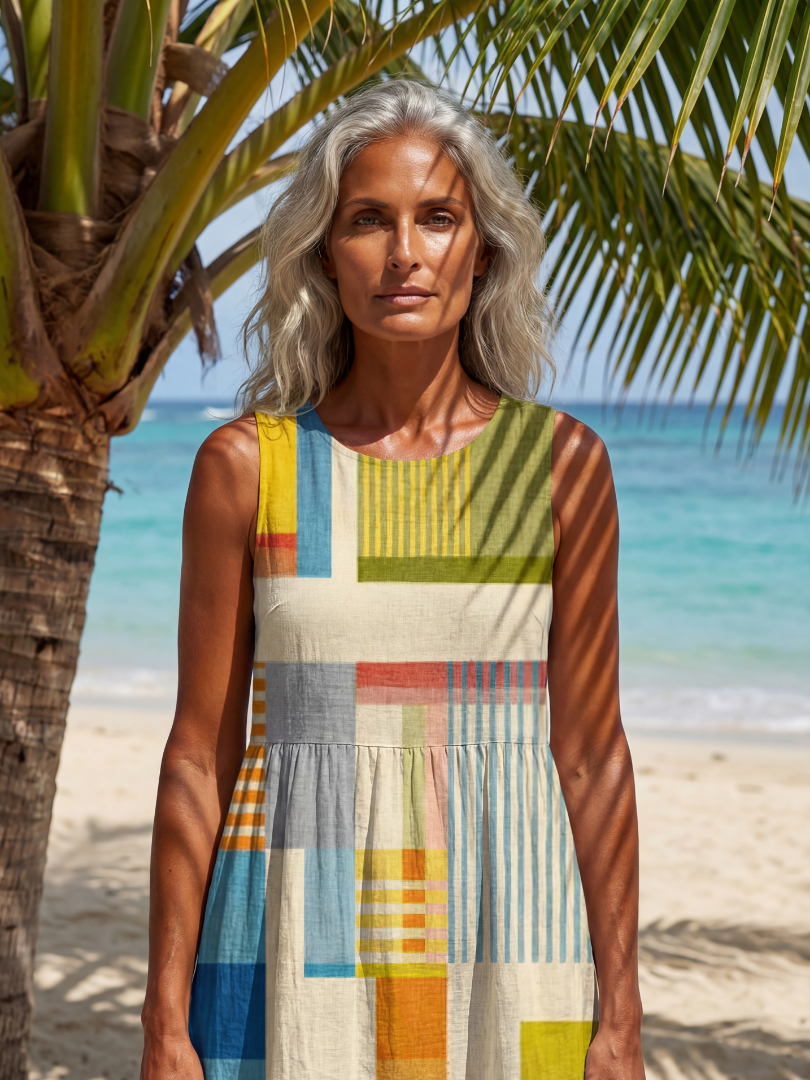 Relaxed fit women's midi dress with vibrant painted block patchwork design, perfect for summer casual wear.
