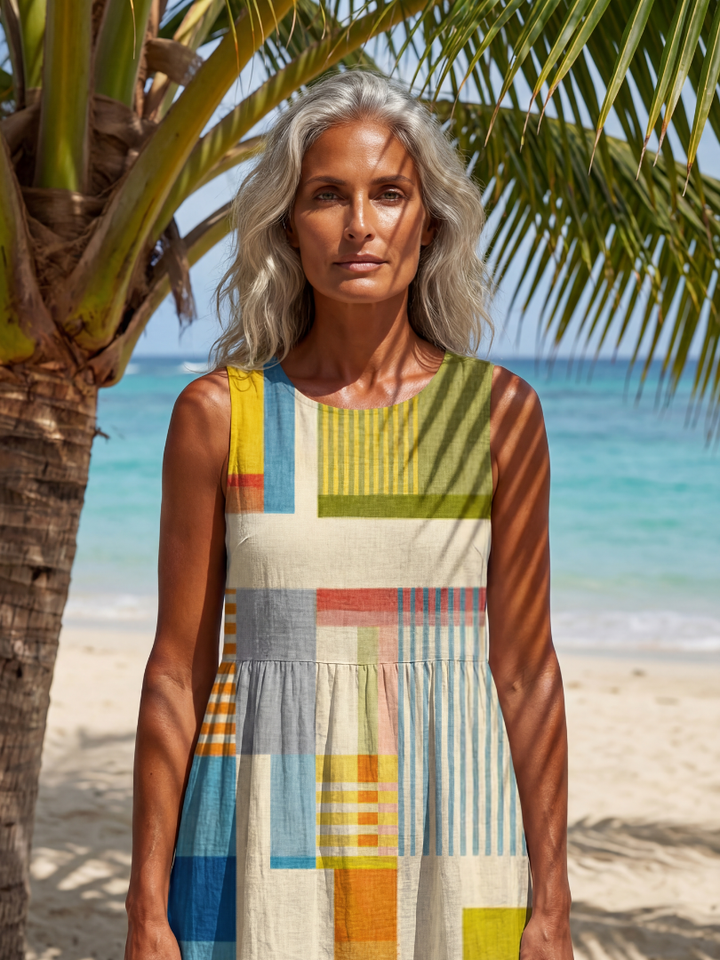 Relaxed fit women's midi dress with vibrant painted block patchwork design, perfect for summer casual wear.
