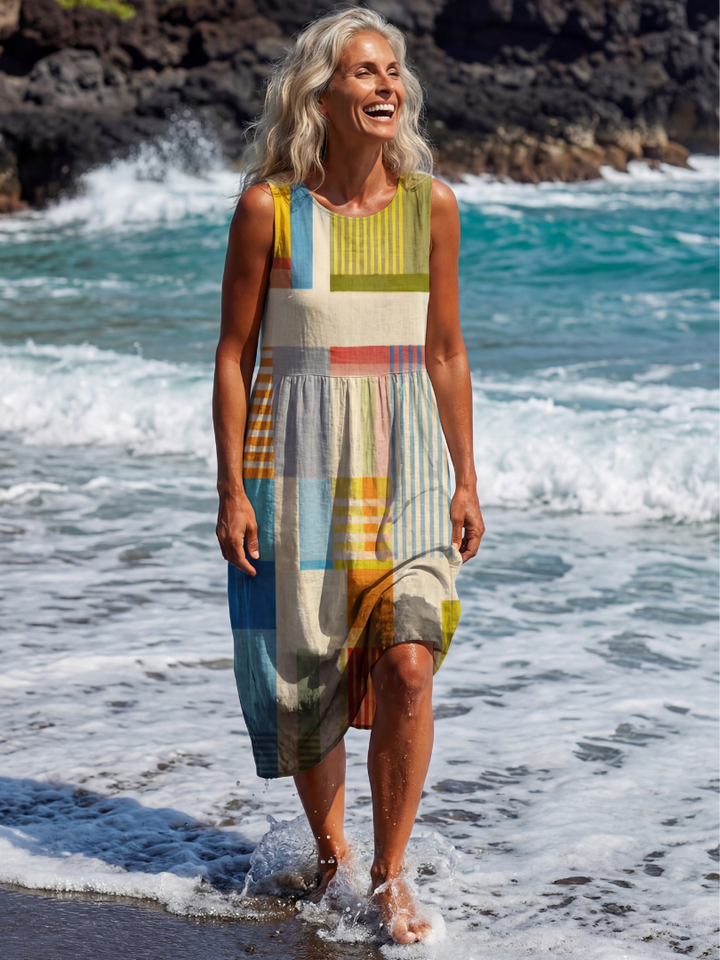 Effortless women's sleeveless midi dress featuring unique painted block print for versatile summer fashion.