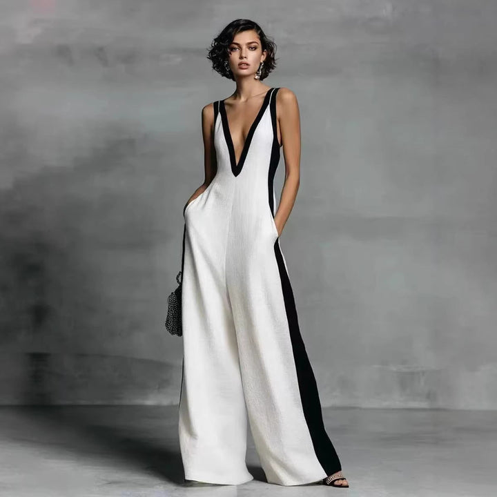 Women's colour-block wide-leg jumpsuit with V-neck, sleeveless design. Elegant & comfortable for smart-casual wear.