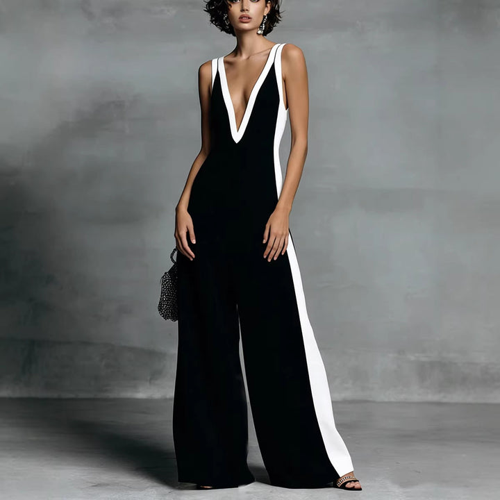 Comfortable women's colour-block wide-leg jumpsuit. Sleeveless V-neck, an elegant one-piece for smart casual or evening.
