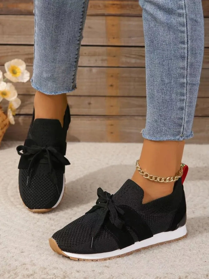 Women's comfort-fit lightweight walking sneakers for breathable, active daily wear.