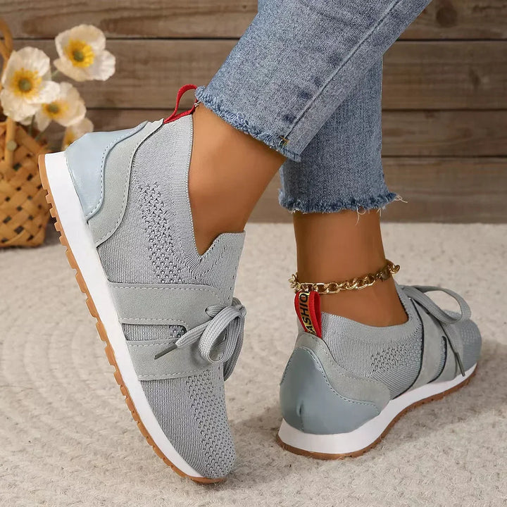 Versatile women's lightweight walking sneakers, offering comfort and breathability for everyday activities.