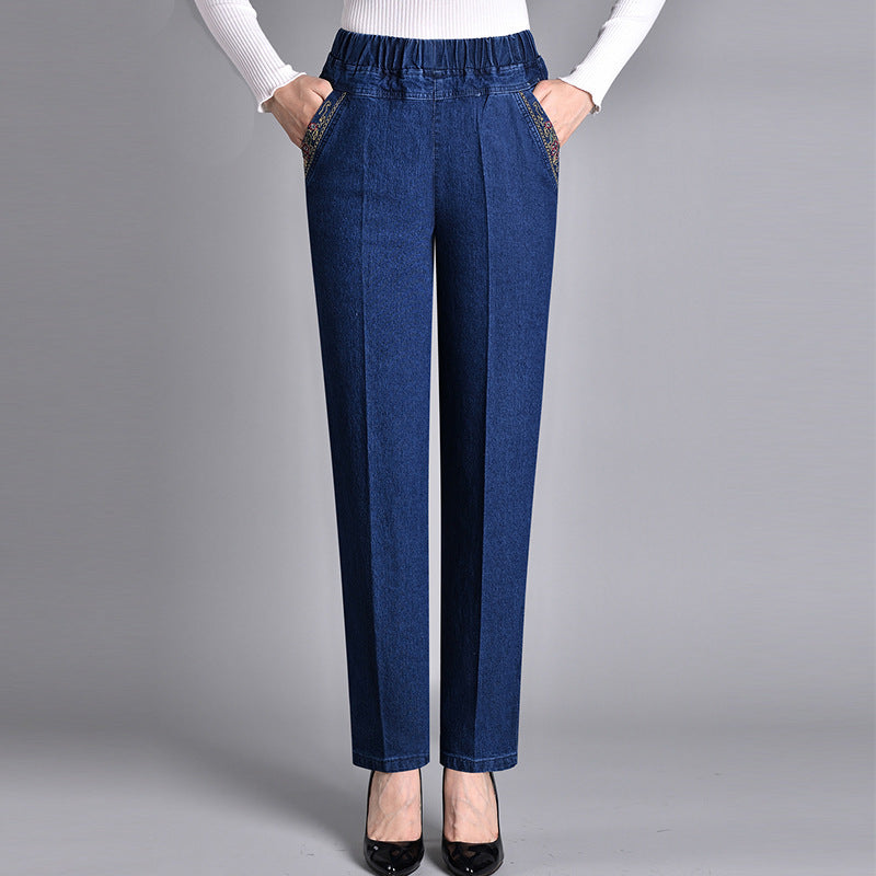 Versatile women's denim jeans, comfort-fit, elastic waist, side pockets. Ideal casual pants for fall/winter style.