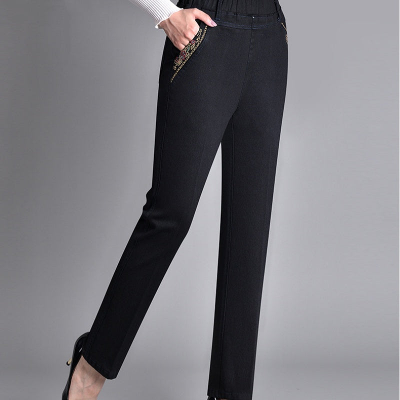 Fall/winter women's comfort-fit denim jeans. Straight leg, elastic waist, side pockets for warmth & style.