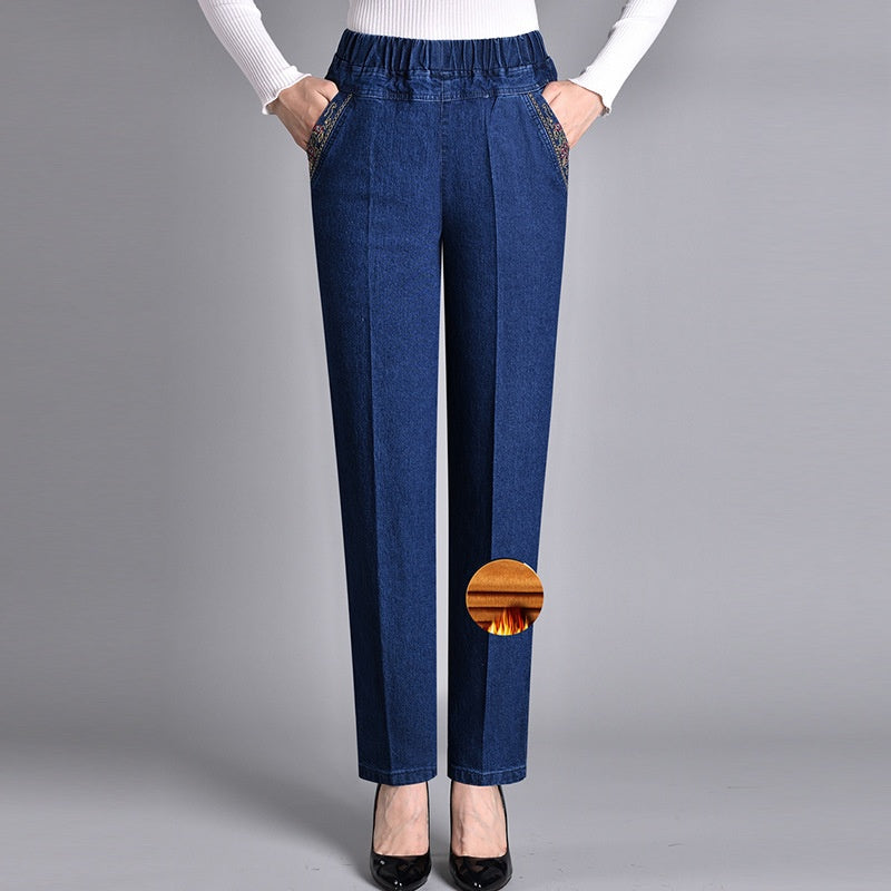 Soft denim comfort-fit jeans for women with elastic waistband, straight leg, & side pockets. Casual & cozy.