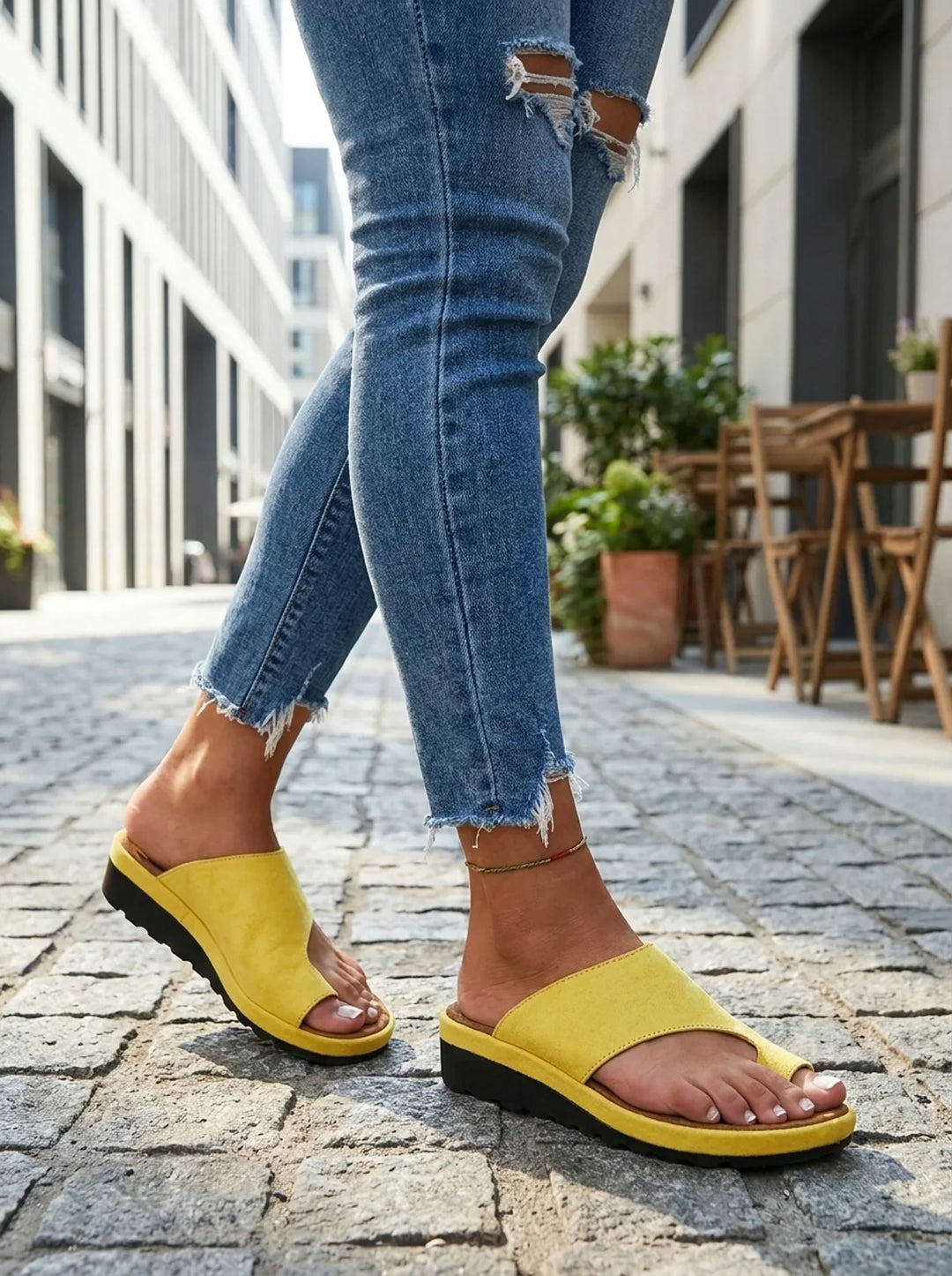 Fashionable women's comfort sandals, toe-post design with essential arch support.