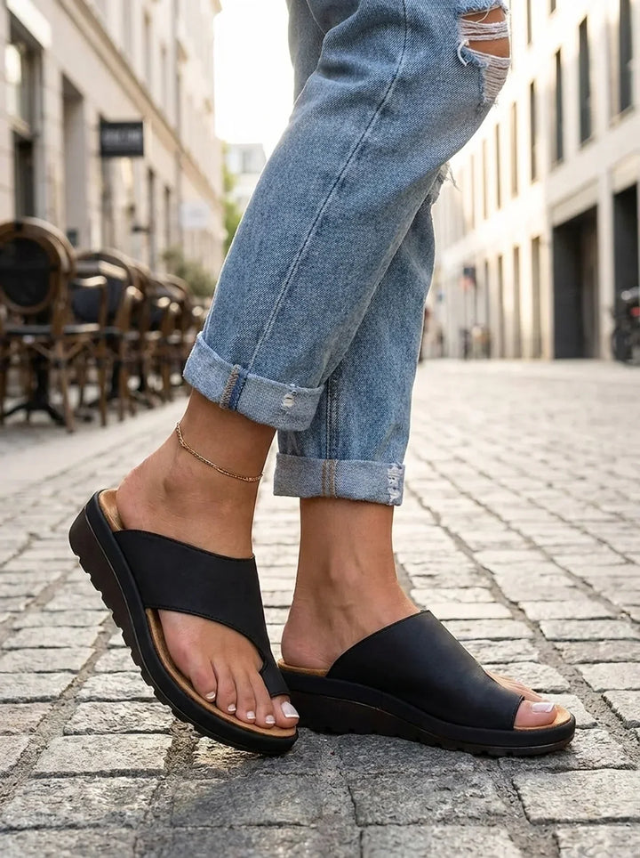 Orthopedic women's toe-post sandals for superior comfort and foot arch support.