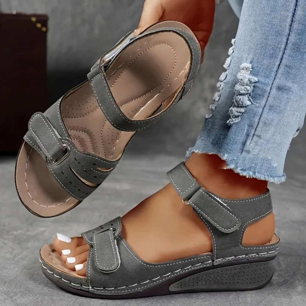 Strappy women's platform sandals with adjustable hook-and-loop closure for a comfortable, wide fit.