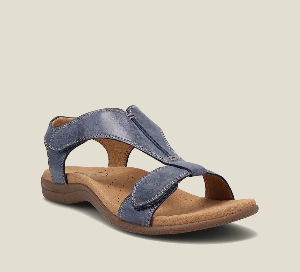 Secure fit women's flat sandals with adjustable straps and open toe, ideal for comfortable summer walking.