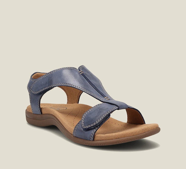 Secure fit women's flat sandals with adjustable straps and open toe, ideal for comfortable summer walking.