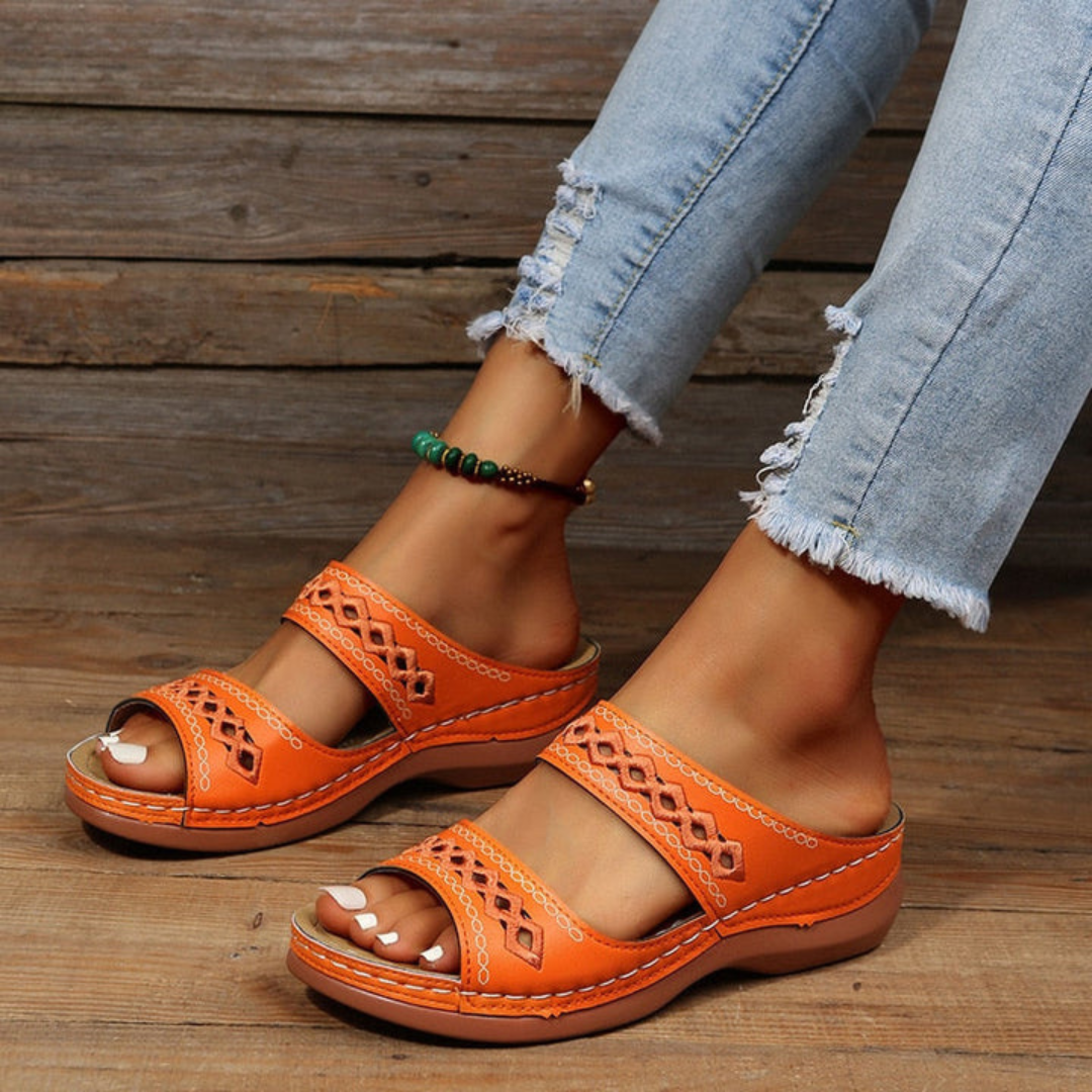 Stylish women's slide sandals, perfect casual summer footwear with essential arch support and comfort.