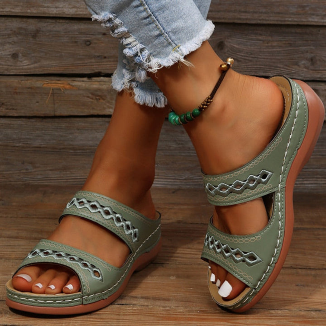 Women's casual slide sandals featuring orthopedic arch support, comfortable design, and summer style.