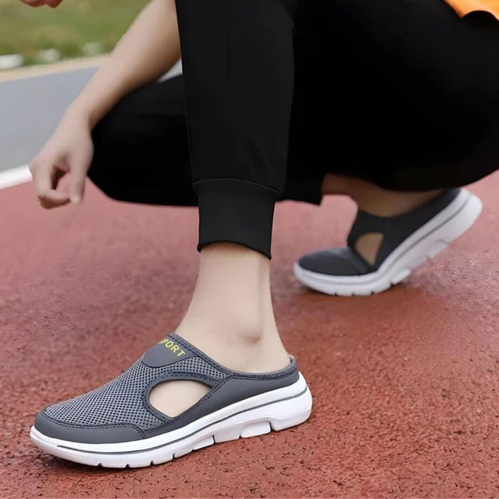 Comfortable women's slip-on sandals, breathable cutout design for easy everyday summer wear.
